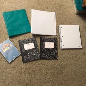 There’re 2 binders, 3 notebooks, and a planner